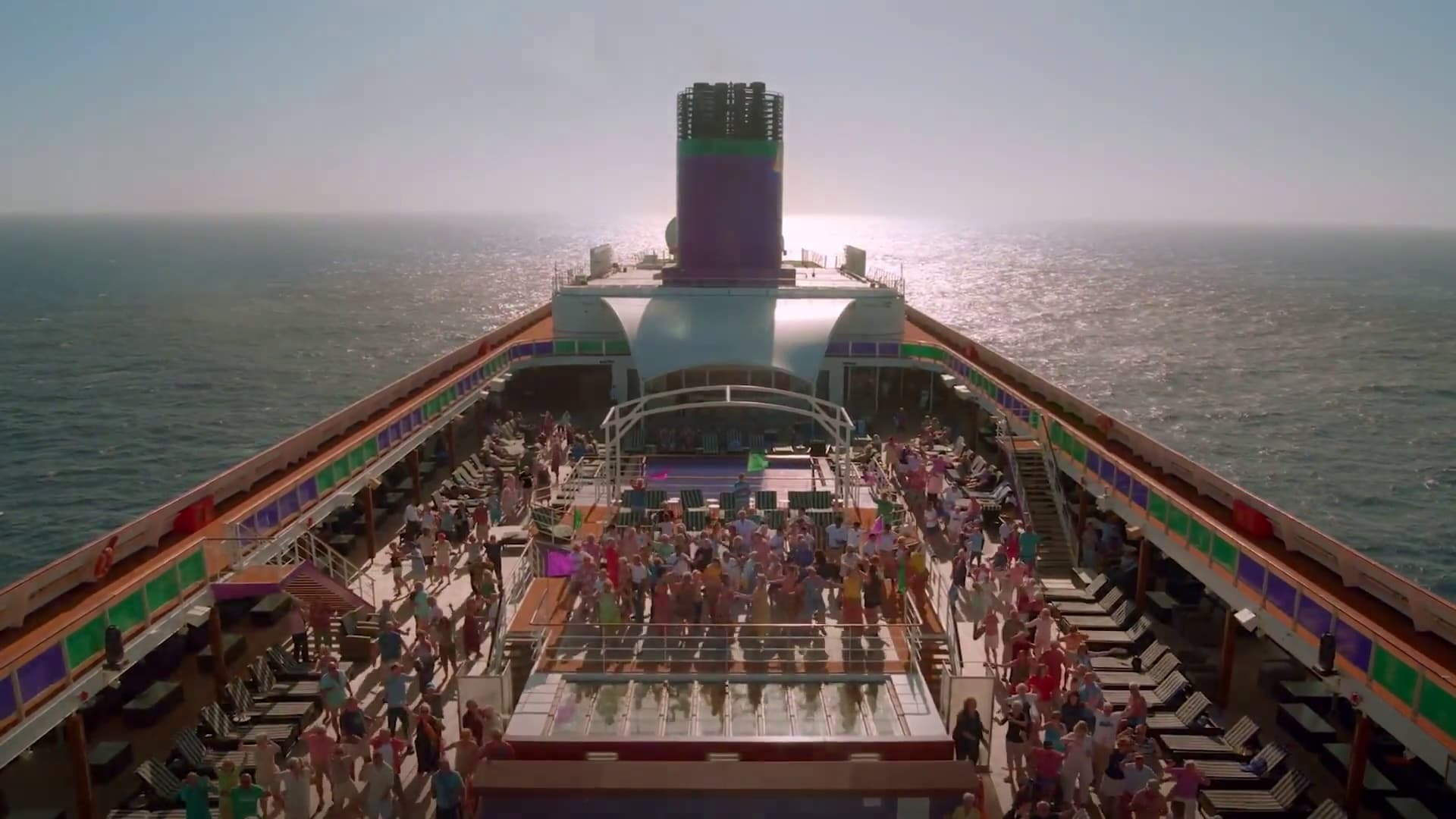 Cruise ship deck with people enjoying a party atmosphere